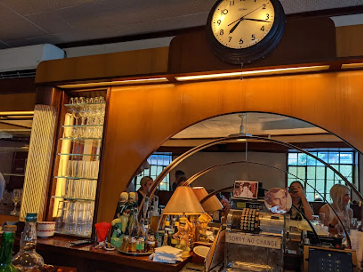 Cozy seating and bar setup at The Long Island Bar in Brooklyn