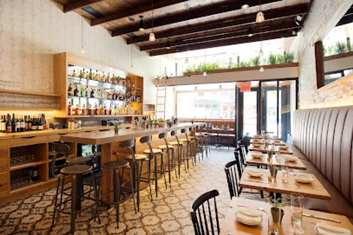 Interior view of Meadowsweet restaurant showing tables and bar area