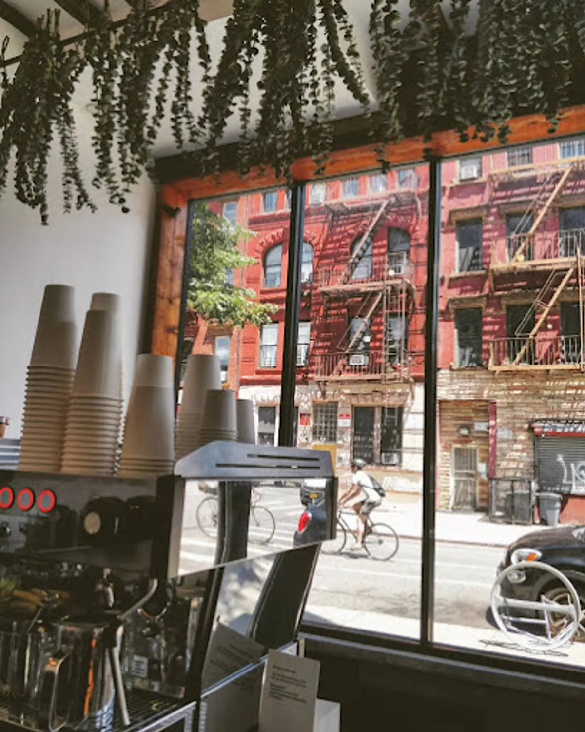 Interior view of Align Coffee/Crepe Master in Brooklyn with customers