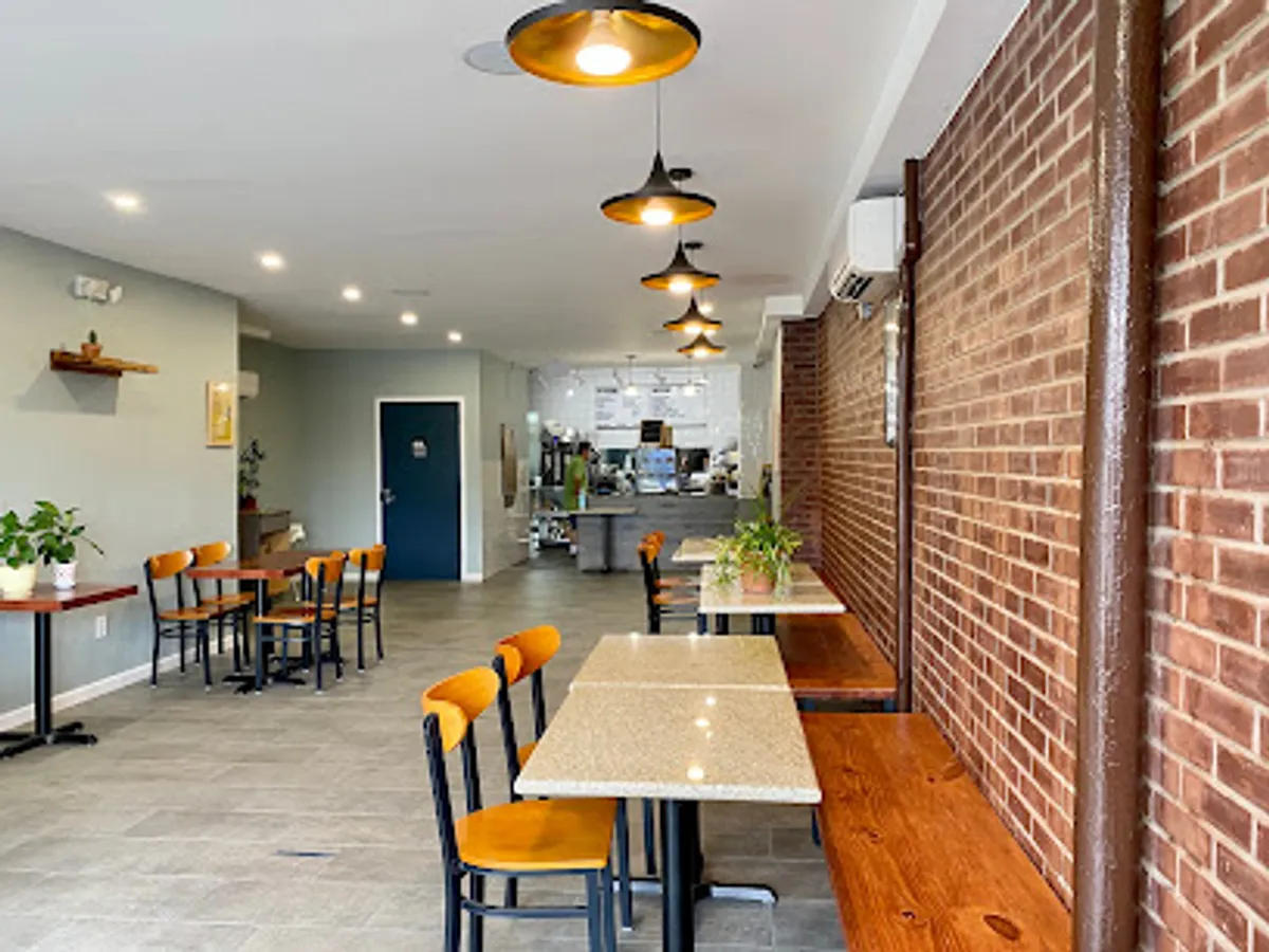 Interior view of Cafe Nube in Brooklyn showing customers dining