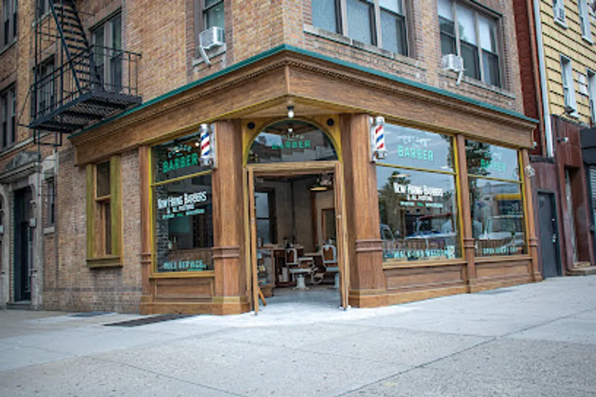 Interior of Cotter Barber/Coffee showing barber chairs and coffee bar